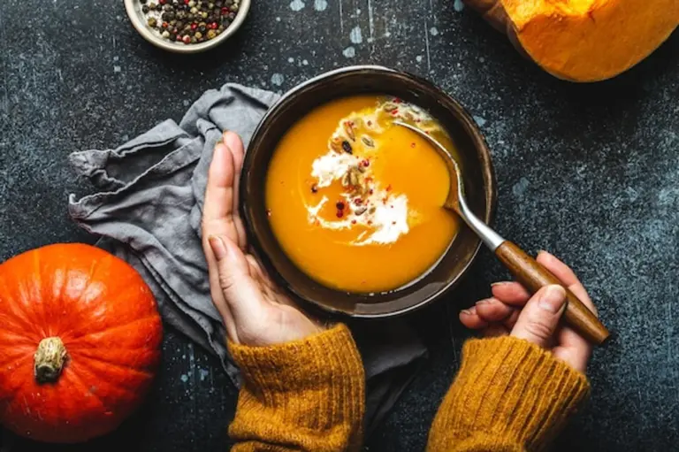 pumpkin soup top view autumn cozy table