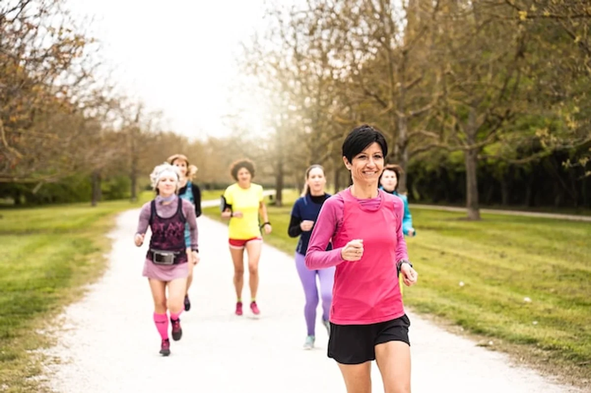 middle aged woman sprinting outdoor