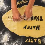 autumn pastry dough in hands rustic kitchen