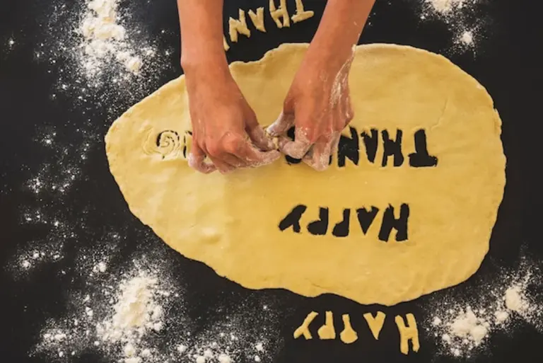 autumn pastry dough in hands rustic kitchen