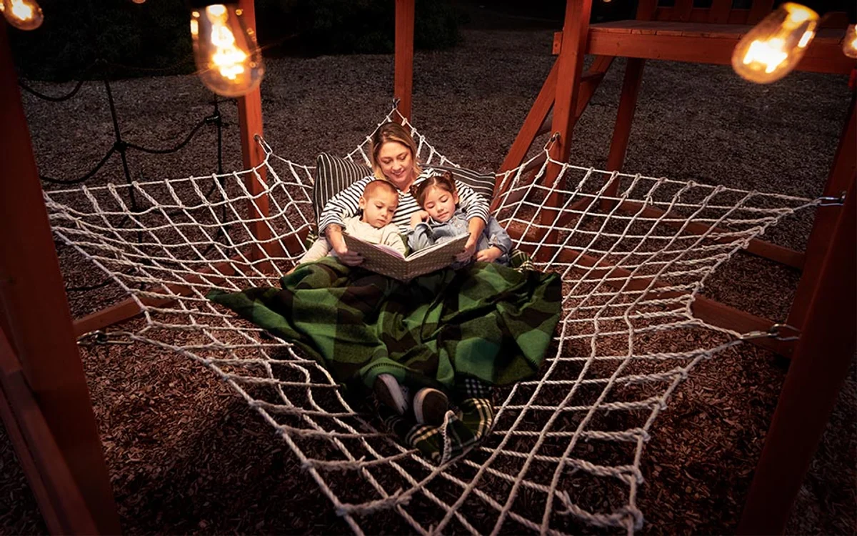 family observing stars backyard safety tips telescope night