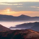 fiery autumn sunset sky over Czech landscape