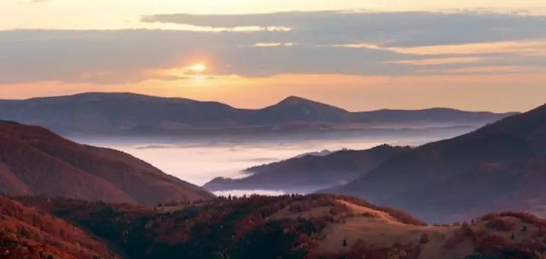 fiery autumn sunset sky over Czech landscape
