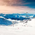 panoramic view snowy European ski resort vibrant action