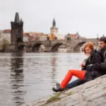 happy adult couple traveling czech republic relaxing