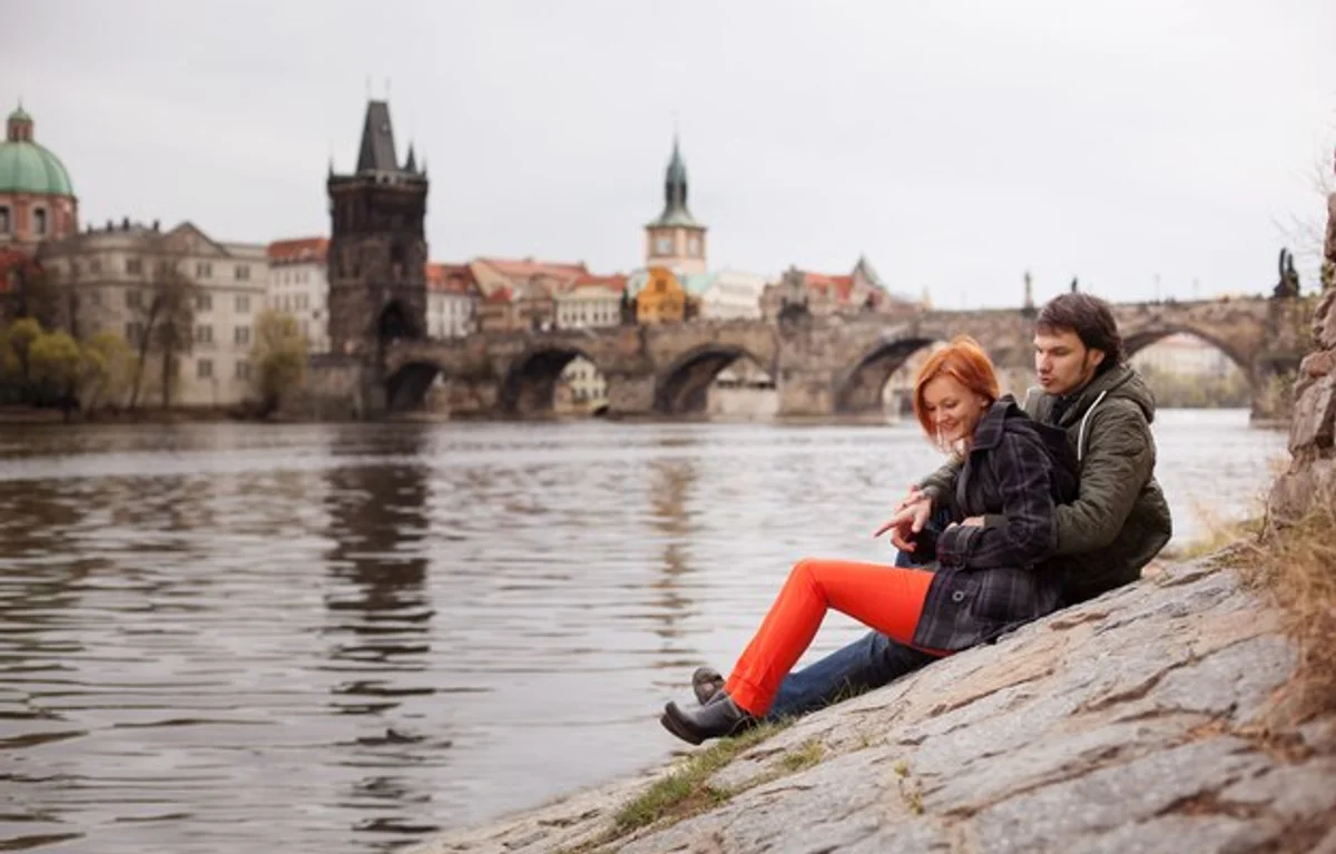 happy adult couple traveling czech republic relaxing