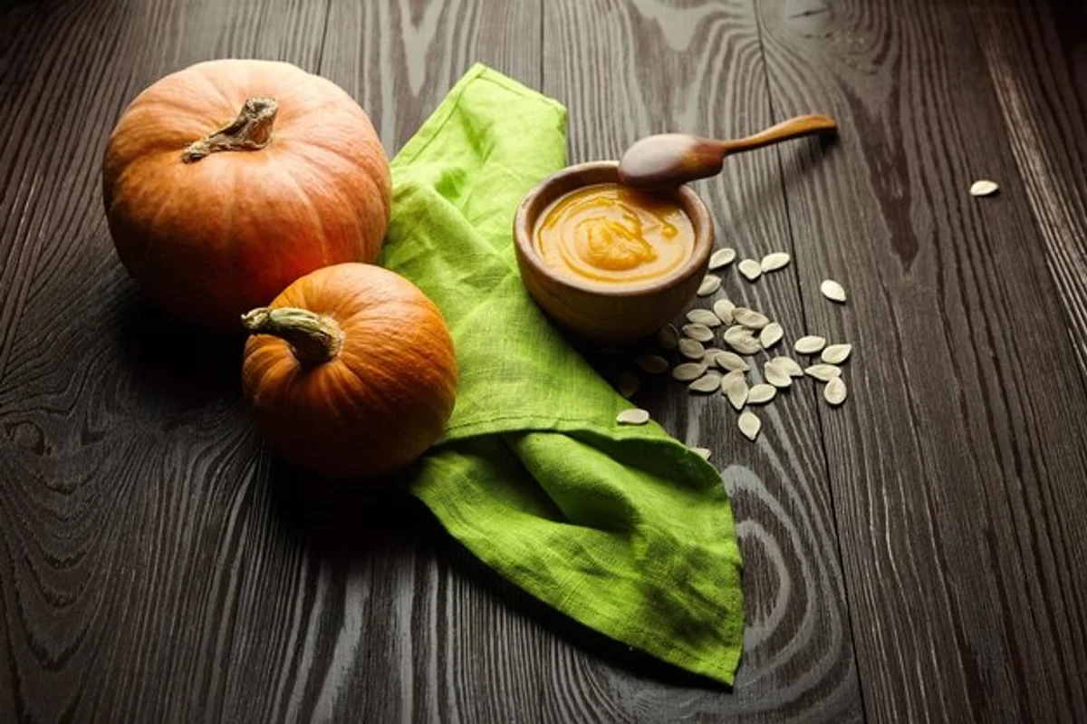 pumpkin soup in rustic bowl autumn dinner mood
