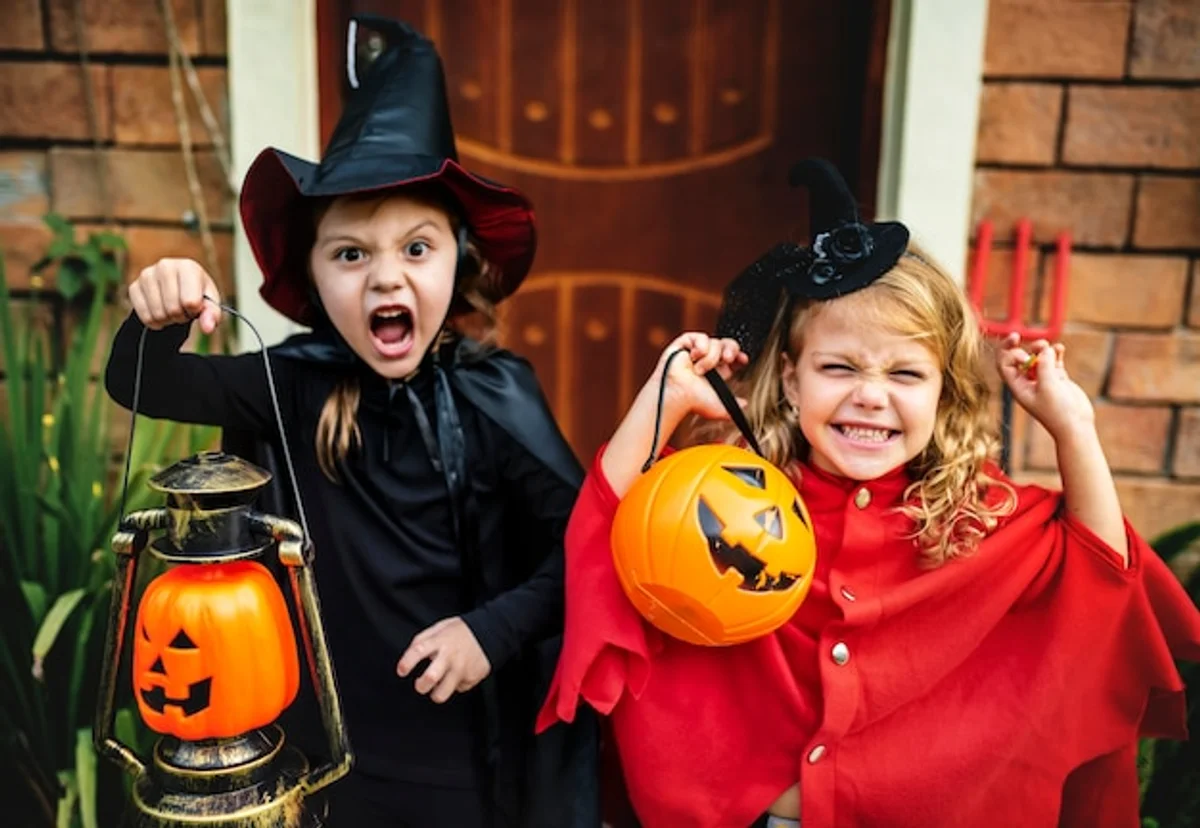 kids trick-or-treating american halloween night pumpkins