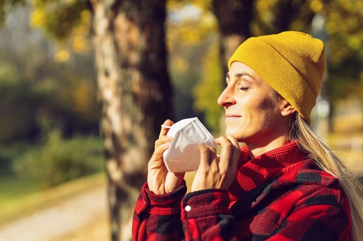 deep breathing in autumn city park