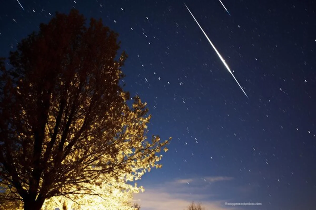 night sky October meteors over landscape