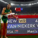 runner breaking world record clock stadium