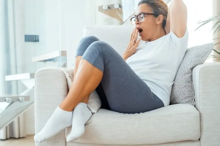 tired woman at home day light