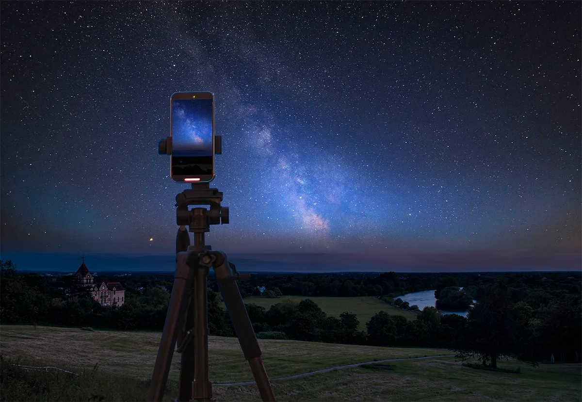home stargazing with smartphone czech window night