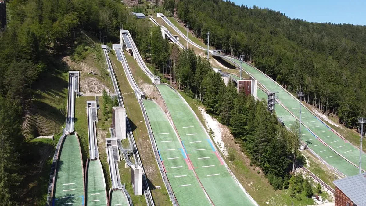 Young athletes competing small Czech town athletics track