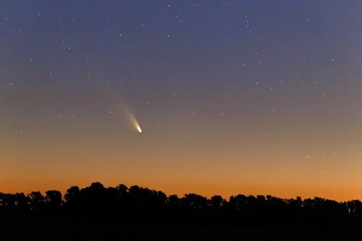 observing comet in autumn night sky czech republic