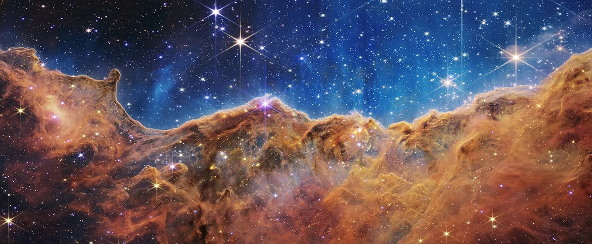 astrobiologist analyzing data from JWST in laboratory