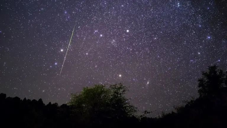 November meteor shower night sky European landscape