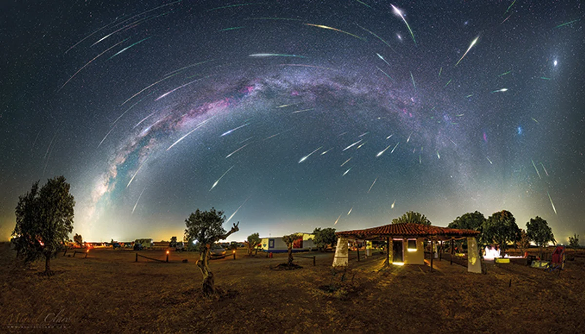bright comet above czech landscape night sky