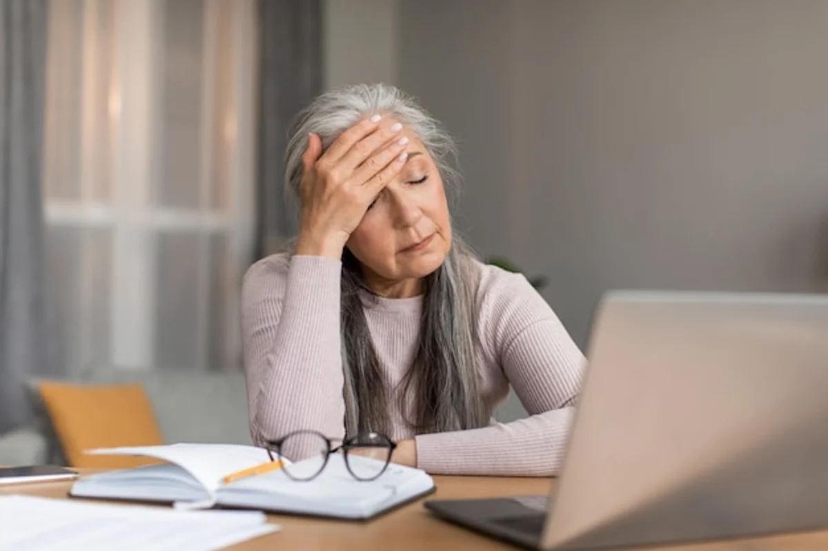 stressed European woman office health concept